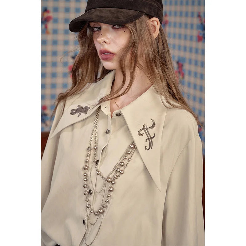 ELFSACK 2025 Winter New Arrivals Soft Preppy Lapel Collar Ruffled Cuff Long-sleeve Shirt For Woman